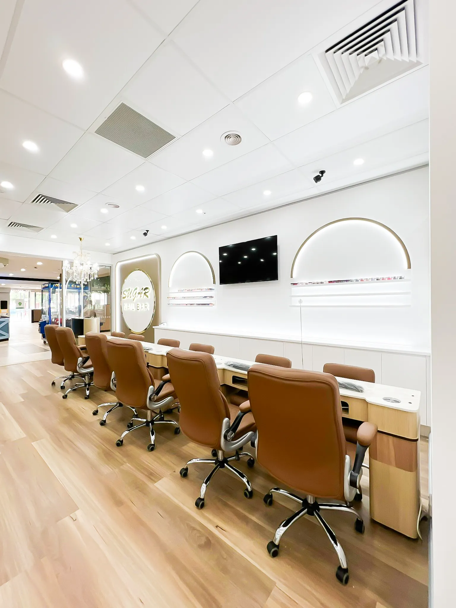 Sugar Nail Bar — Manicure stations and feature signage, IDG Design